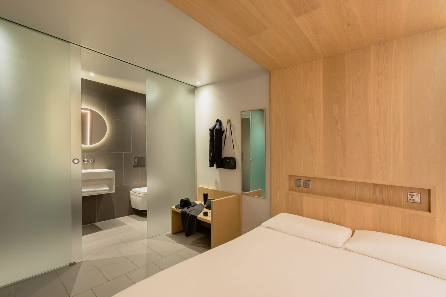 zedwell Hotels Cocoon bedroom and bathroom